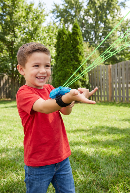 ✔ Glow String Launcher™ (Glow-In-The-Dark Web Toy)